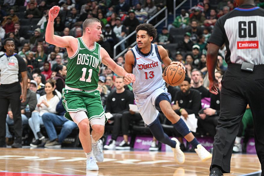 Washington Wizards guard Jordan Poole (13) driving to the basket during the fourth quarter of an NBA game against the Boston Celtics at Capital One Arena in Washington D.C., December 15, 2024. (Photo for the Washington Times)
