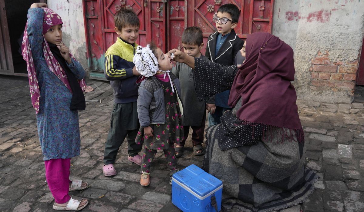 NextImg:Roadside bomb kills 3 police officers escorting polio workers in northwest Pakistan