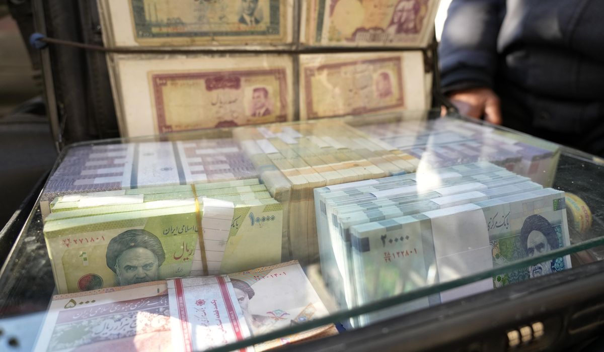 NextImg:Iran’s rial hits a record low, battered by regional tensions and an energy crisis