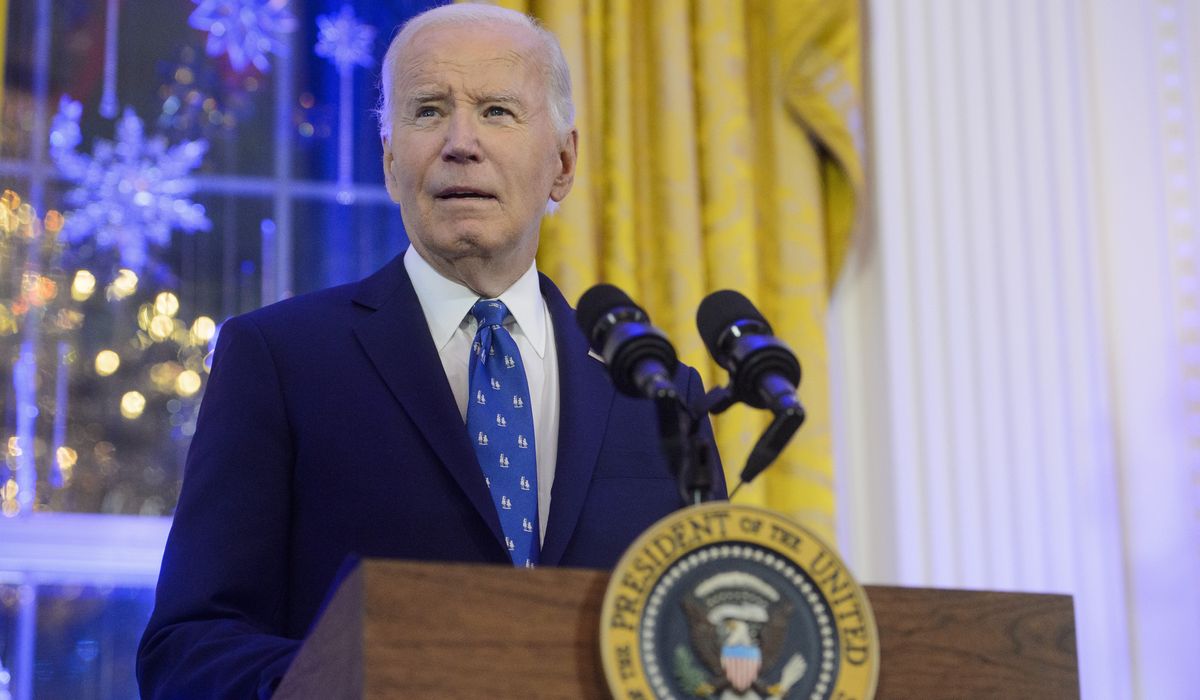 NextImg:Biden pledges to cut U.S. greenhouse gases by more than 60% as he exits the world stage