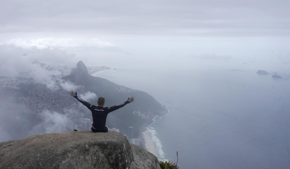 NextImg:A paraplegic man in Brazil is lifted into the clouds on one of Rio de Janeiro’s hardest trails