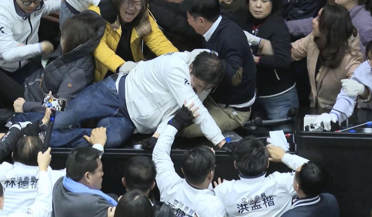 NextImg:Taiwan lawmakers clash after one party breaks into legislature to occupy speaker’s chair