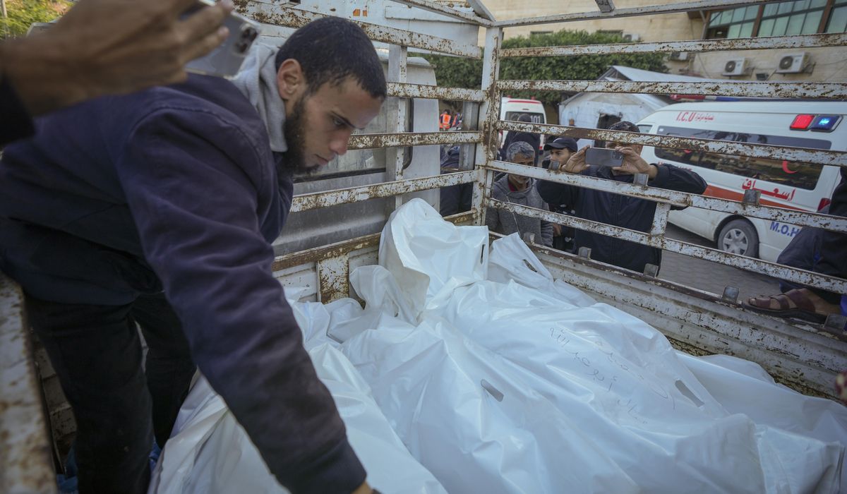 NextImg:A rocket from Yemen strikes Tel Aviv, injuring 16, as Palestinians mourn 19 dead in Gaza