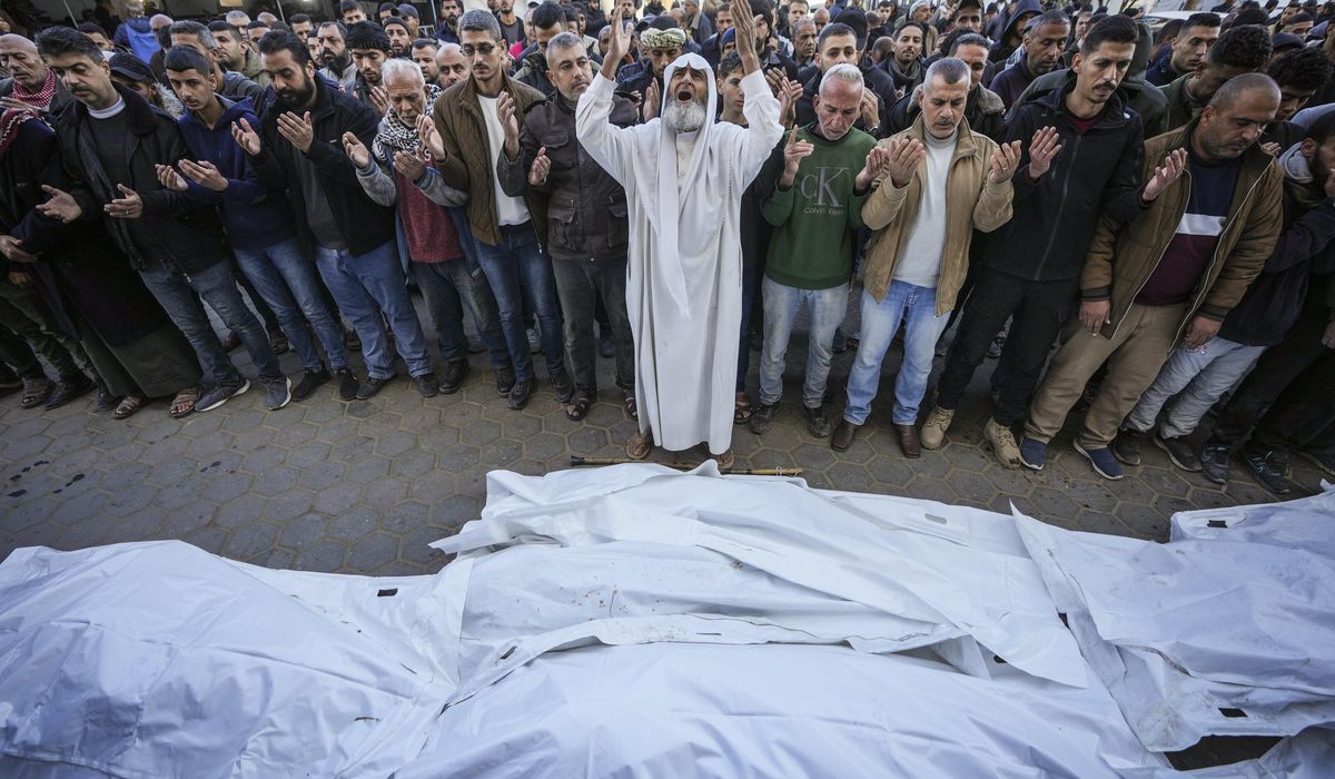 NextImg:Israeli strikes in Gaza kill at least 22 as Vatican envoy visits Christians for pre-Christmas Mass