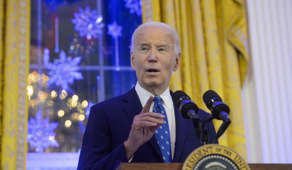 NextImg:Biden signs defense bill despite objections to ban on transgender health care for military children