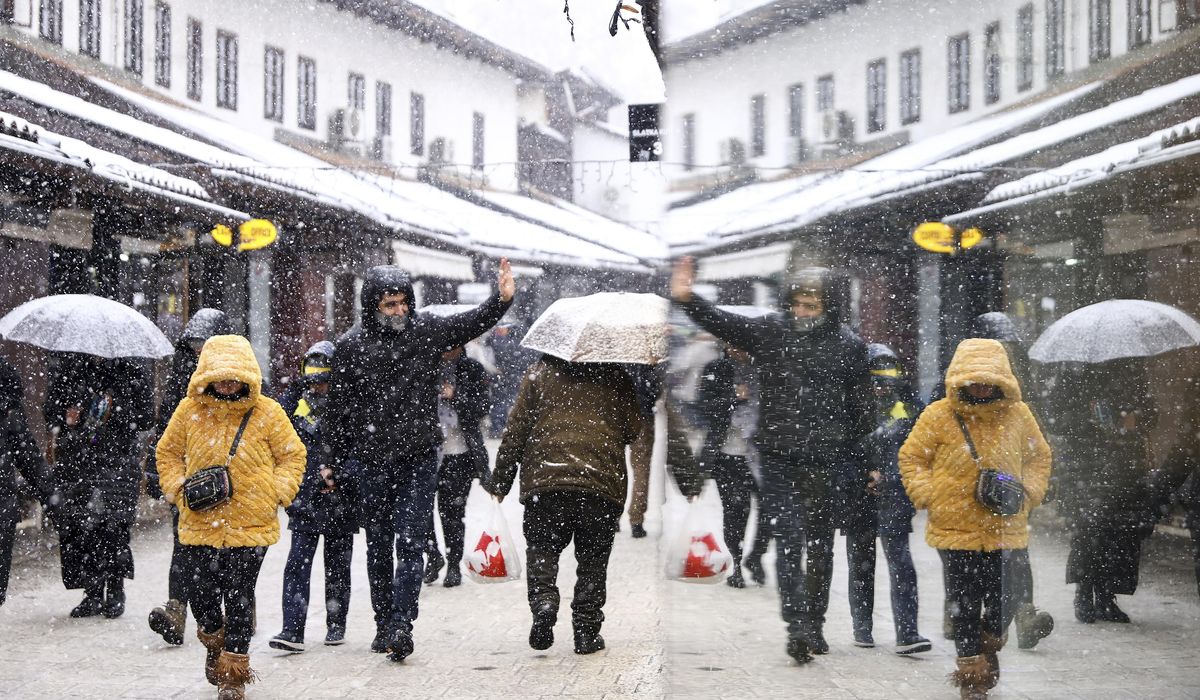 NextImg:Rescue of hikers in Slovenia resumes as snow brings traffic chaos and power outages across Balkans