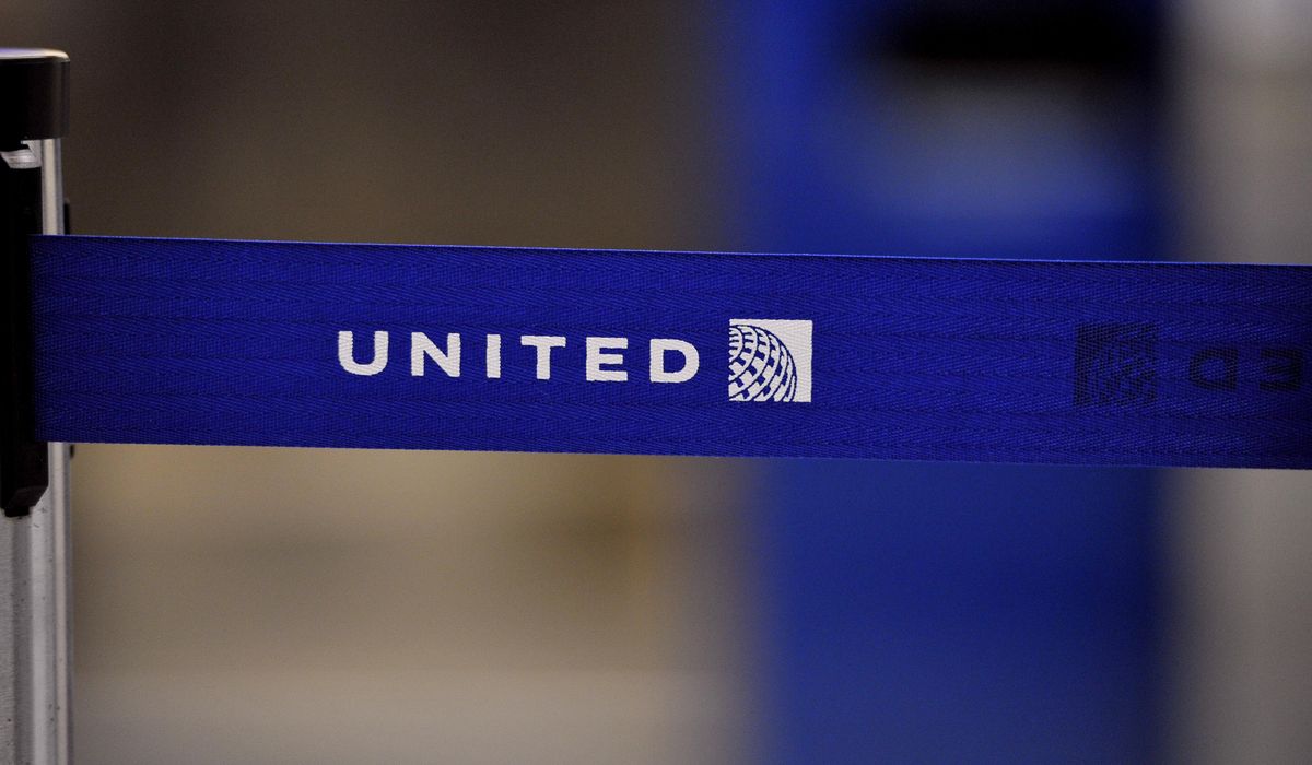 NextImg:Dead body found in wheel well of United plane from Chicago to Maui