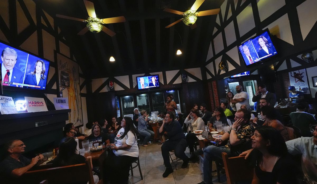 NextImg:Americans are exhausted by political news. TV ratings and a new AP-NORC poll show they’re tuning out