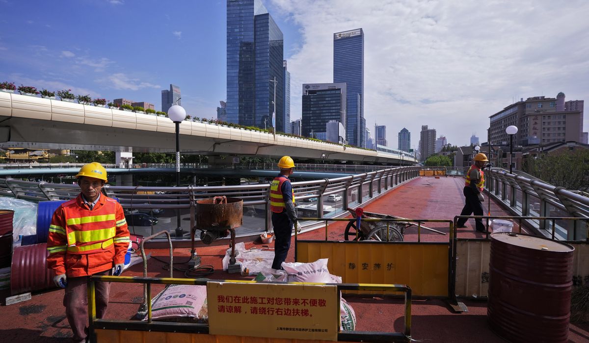 NextImg:China raises its estimate for the size of its economy in 2023