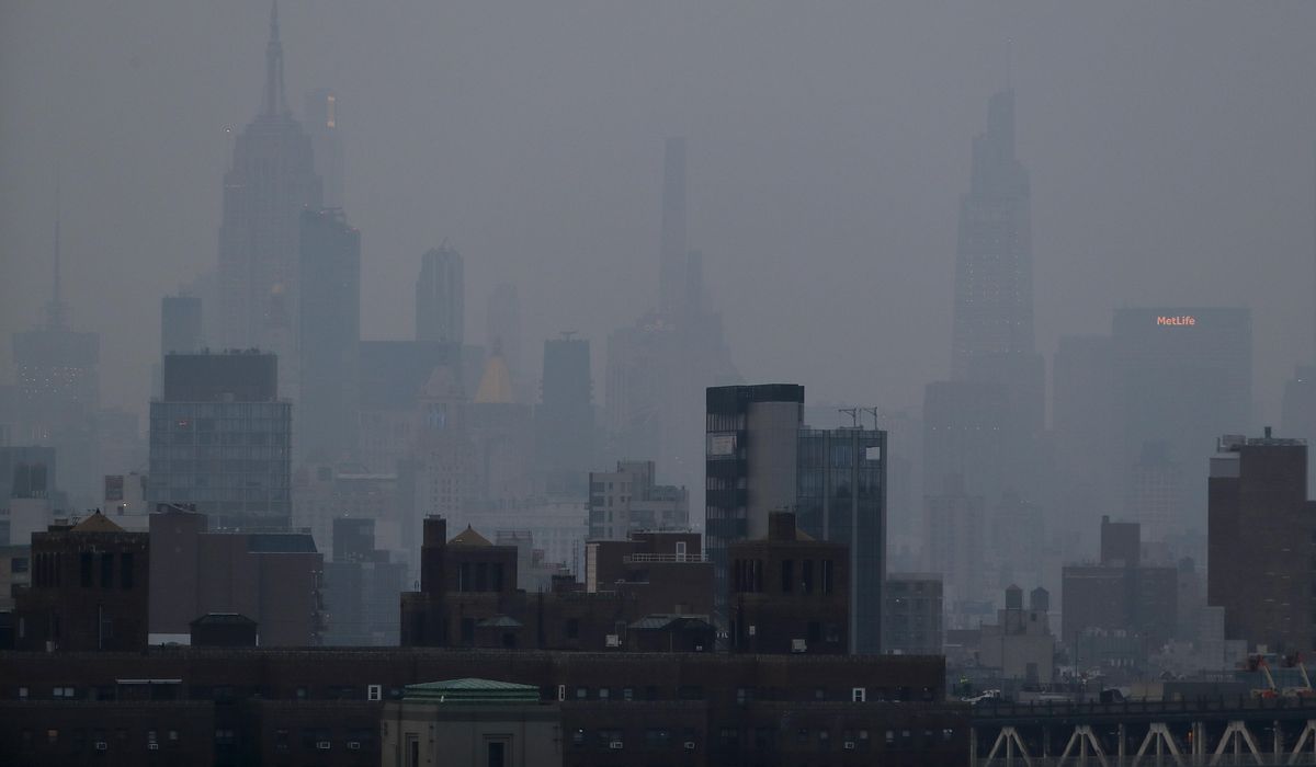 NextImg:New York to charge fossil fuel companies for damage from climate change