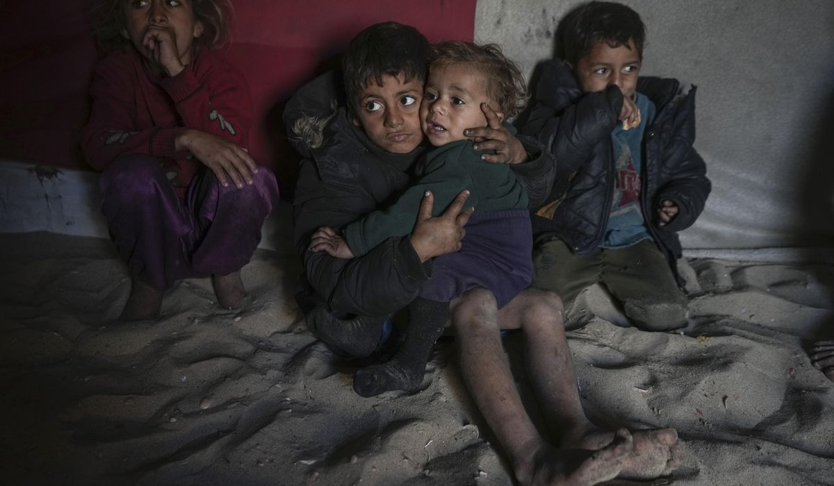 NextImg:Israeli troops forcibly remove staff and patients from northern Gaza hospital, officials say