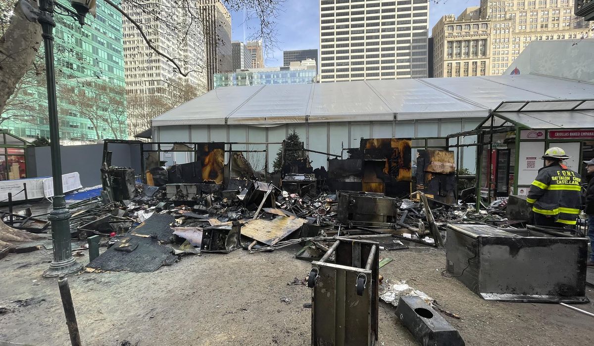 NextImg:Fire engulfs section of popular Manhattan holiday market