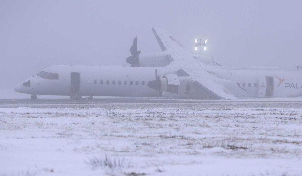 NextImg:Flights temporarily suspended at Halifax airport after airplane landing incident