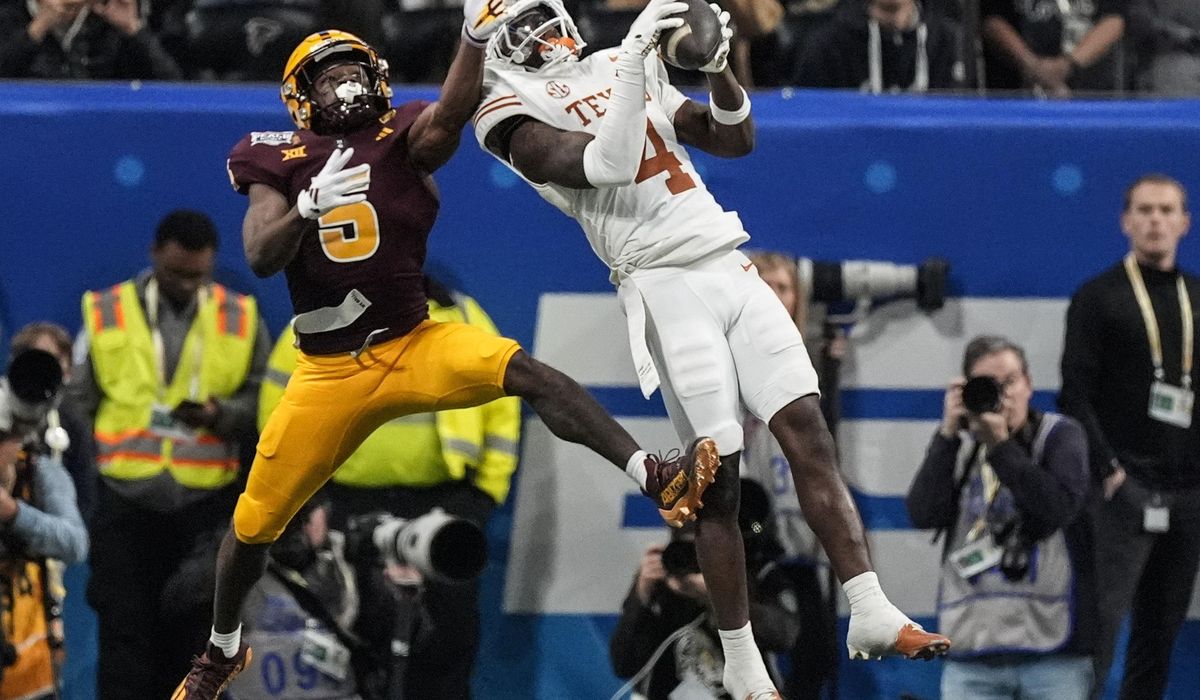 NextImg:Texas avoids huge upset, beats Arizona State 39-31 in double overtime in Peach Bowl