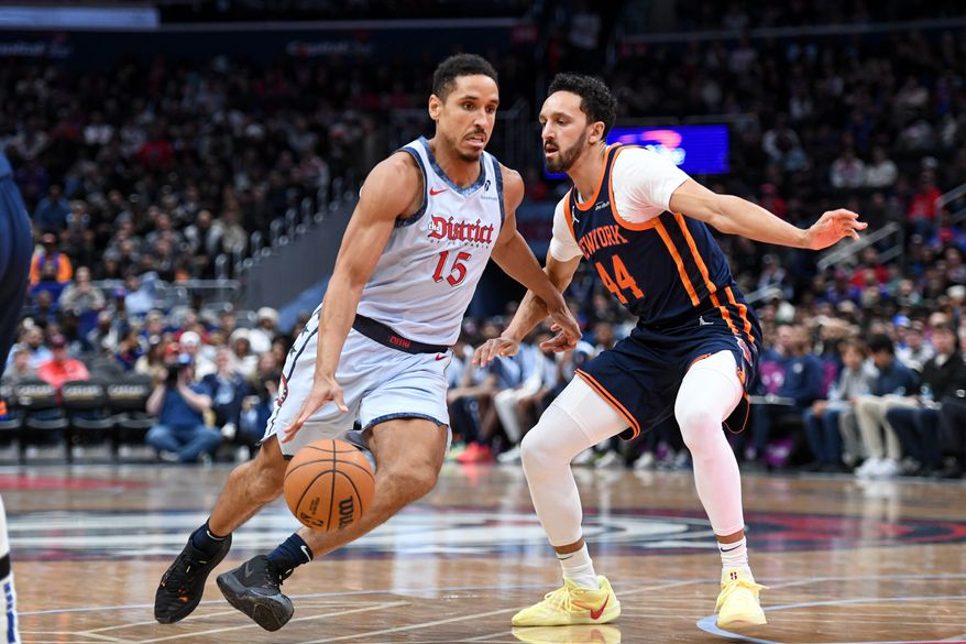 Washington Wizards guard Malcolm Brogdon (15) driving to the hoop during the fourth quarter of an NBA game against the New York Knicks at Capital One Arena in Washington D.C., December 30, 2024. (Photo for the Washington Times).
