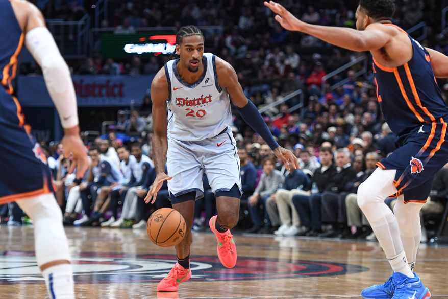 Washington Wizards center Alex Sarr (20) dribbling the ball during the fourth quarter of an NBA game against the New York Knicks at Capital One Arena in Washington D.C., December 30, 2024. (Photo for the Washington Times).
