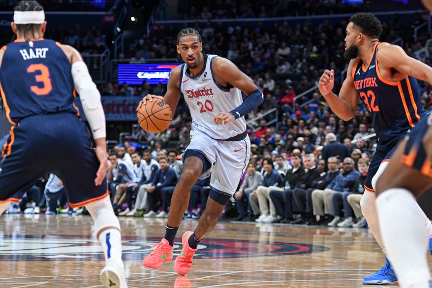 Washington Wizards center Alex Sarr (20) driving to the basket during the fourth quarter of an NBA game against the New York Knicks at Capital One Arena in Washington D.C., December 30, 2024. (Photo for the Washington Times).