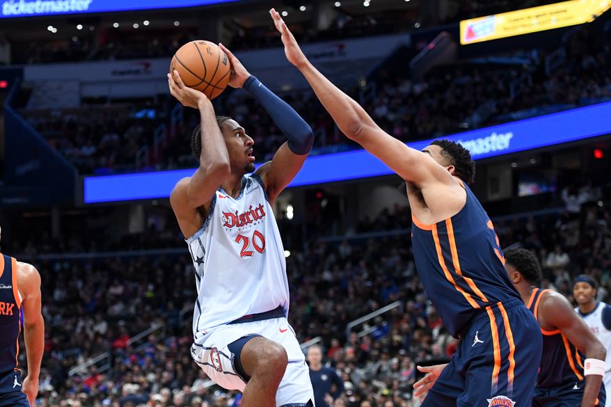 Washington Wizards center Alex Sarr (20) putting up a shot during the fourth quarter of an NBA game against the New York Knicks at Capital One Arena in Washington D.C., December 30, 2024. (Photo for the Washington Times).