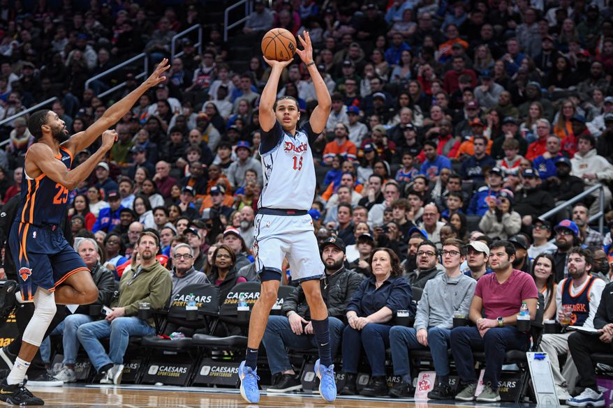 Washington Wizards forward Kyshawn George (18) putting up a shot during the fourth quarter of an NBA game against the New York Knicks at Capital One Arena in Washington D.C., December 30, 2024. (Photo for the Washington Times).