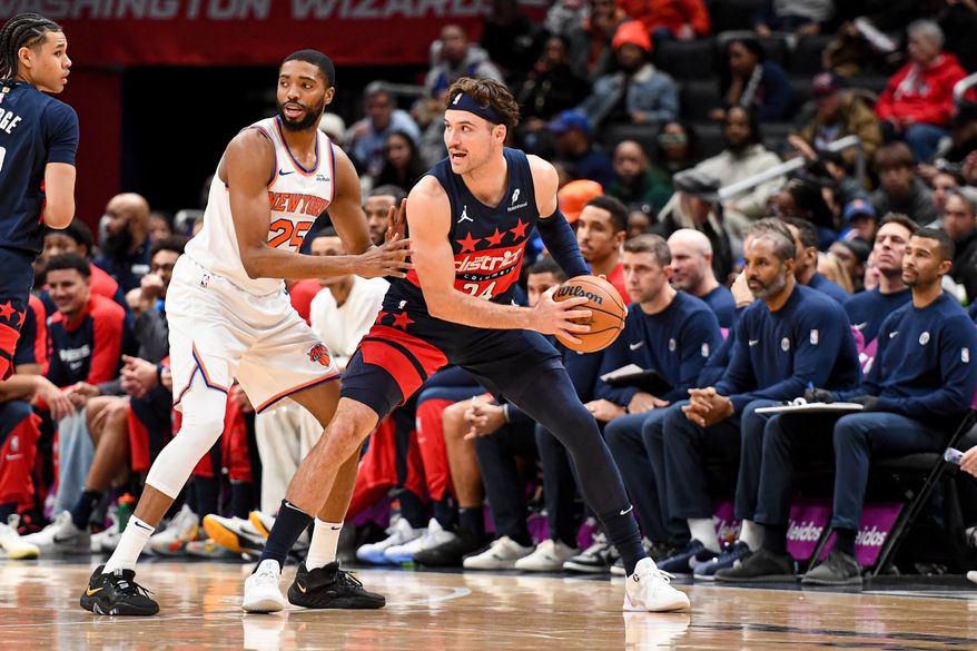 Washington Wizards guard Corey Kispert (24) looking to pass the ball during the first quarter of an NBA game against the New York Knicks at Capital One Arena in Washington D.C., December 28, 2024. (Photo for the Washington Times).