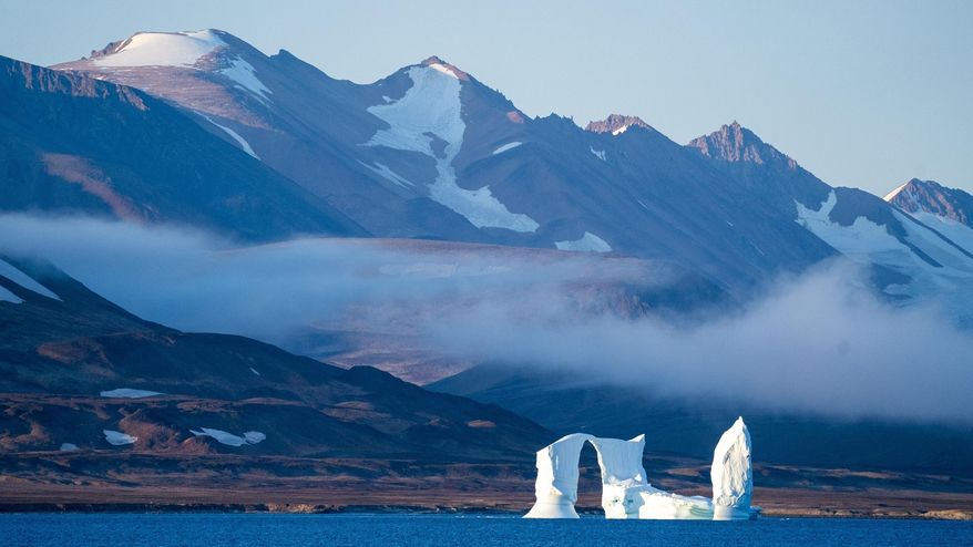 An iceberg floats in the Scoresby Sund, on Sept. 12, 2023, in Greenland. (AP Photo/Chris Szagola, File)