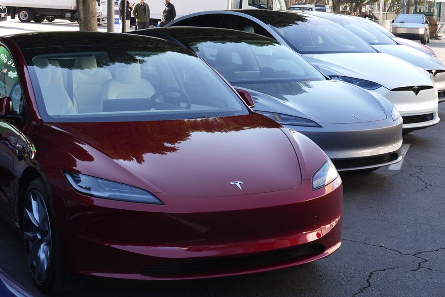 Tesla vehicles are displayed at the AutoMobility LA Auto Show in Los Angeles on Nov. 21, 2024. (AP Photo/Damian Dovarganes) **FILE**