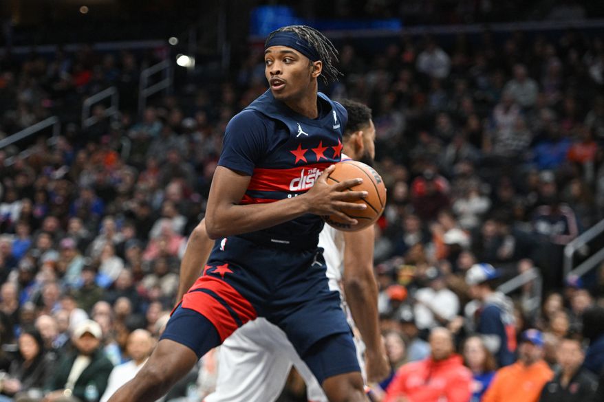 Washington Wizards guard Bub Carrington (8) getting the rebound during the first quarter of an NBA game against the New York Knicks at Capital One Arena in Washington D.C., December 28, 2024. (Photo for the Washington Times).