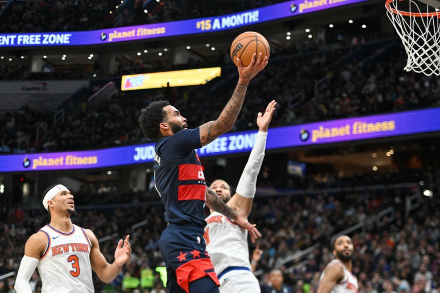 Washington Wizards forward Justin Champagnie (9) putting up a shot during the fourth quarter of an NBA game against the New York Knicks at Capital One Arena in Washington D.C., December 28, 2024. (Photo for the Washington Times).