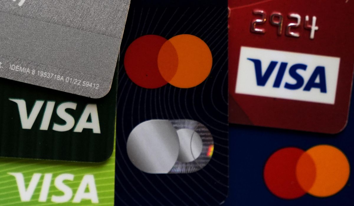 NextImg:Americans owe $1.21 trillion in credit card debt, a record high