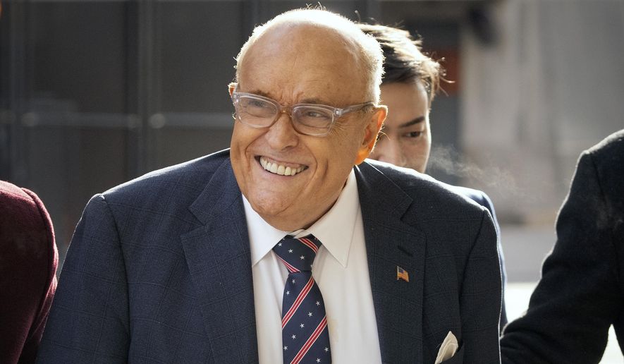 Rudy Giuliani arrives at federal court in Washington, Friday, Jan. 10, 2025. (AP Photo/Mark Schiefelbein) ** FILE **