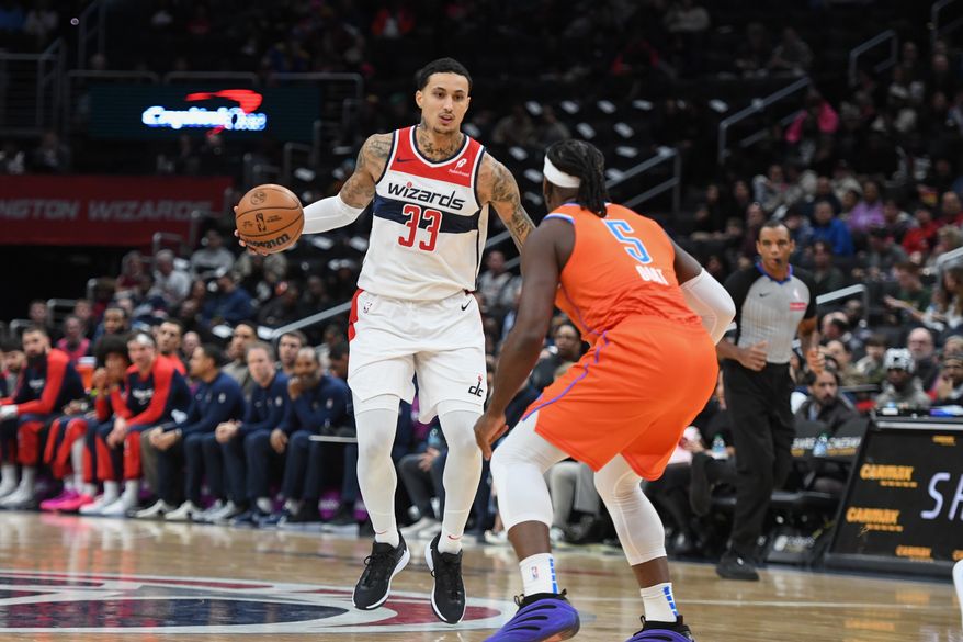 Washington Wizards forward Kyle Kuzma (33) bringing the ball up court during the first quarter of an NBA game against the Oklahoma City Thunder at Capital One Arena in Washington D.C., January 12, 2025. (Photo for the Washington Times)