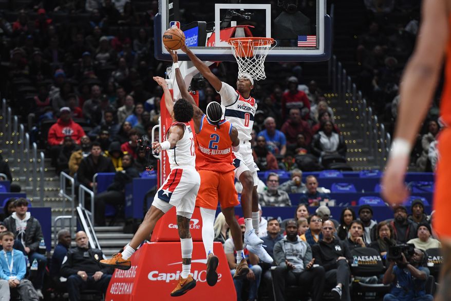 Washington Wizards forward Bilal Coulibaly (0) blocking a shot from Oklahoma City Thunder guard Shai Gilgeous-Alexander (2) during the first quarter of an NBA game at Capital One Arena in Washington D.C., January 12, 2025. (Photo for the Washington Times)