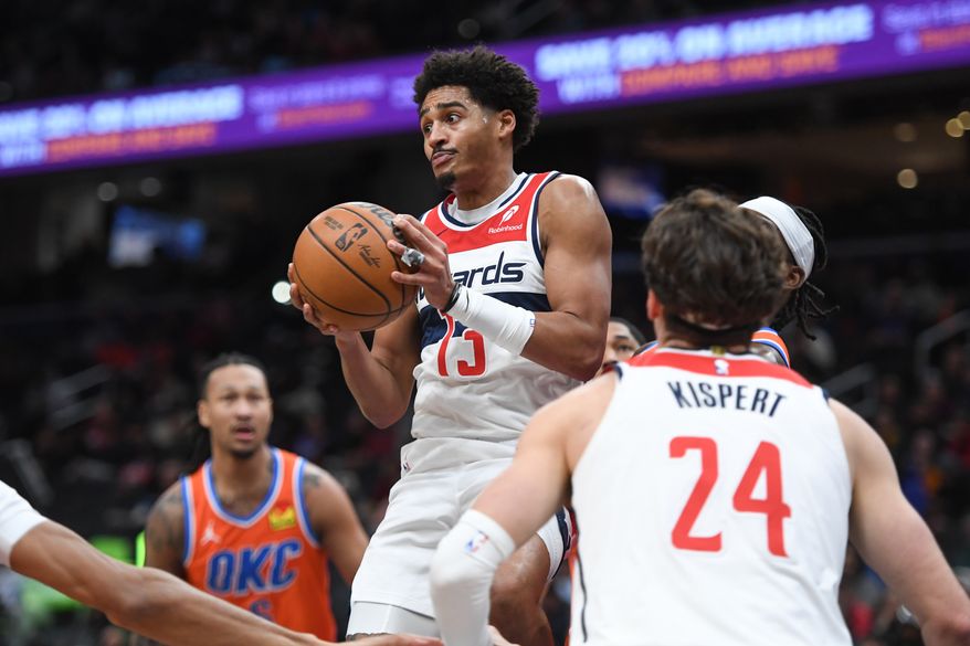 Washington Wizards guard Jordan Poole (13) looking to make a pass under the basket during the first quarter of an NBA game against the Oklahoma City Thunder at Capital One Arena in Washington D.C., January 12, 2025. (Photo for the Washington Times)