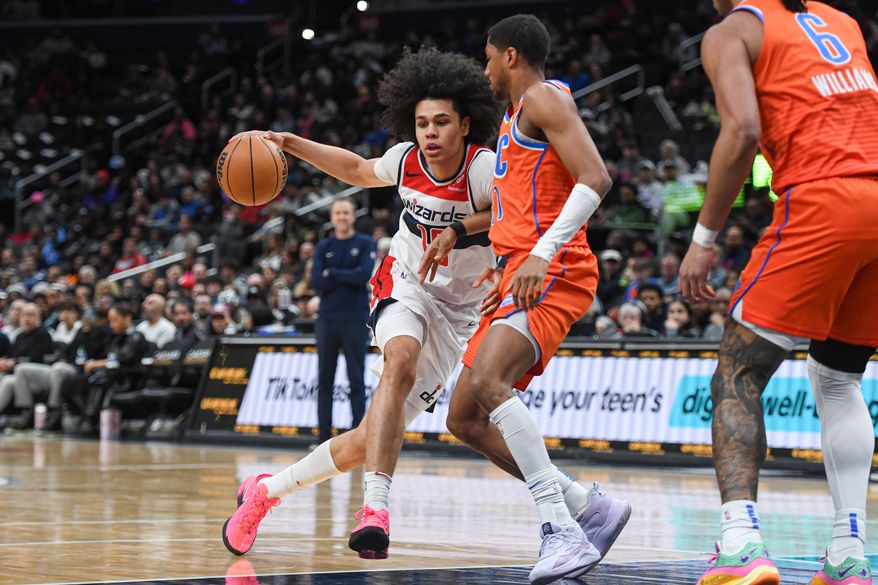 Washington Wizards forward Kyshawn George (18) driving to the basket during the first quarter of an NBA game against the Oklahoma City Thunder at Capital One Arena in Washington D.C., January 12, 2025. (Photo for the Washington Times)