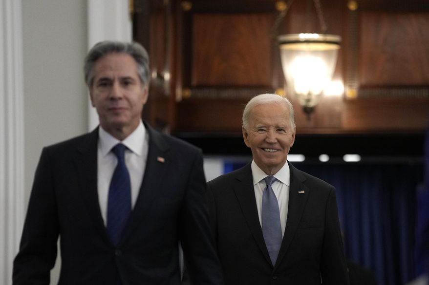 President Joe Biden, left, walks with Secretary of State Antony Blinken, left, as he arrives to give a speech about foreign policy at the State Department in Washington, Monday, Jan. 13, 2025. (AP Photo/Susan Walsh) **FILE**