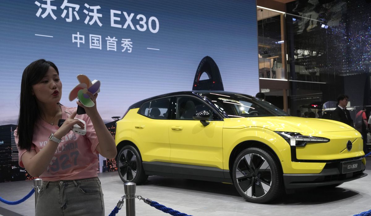 NextImg:China’s electric car sales grew in 2024 as sales of gasoline cars plunged
