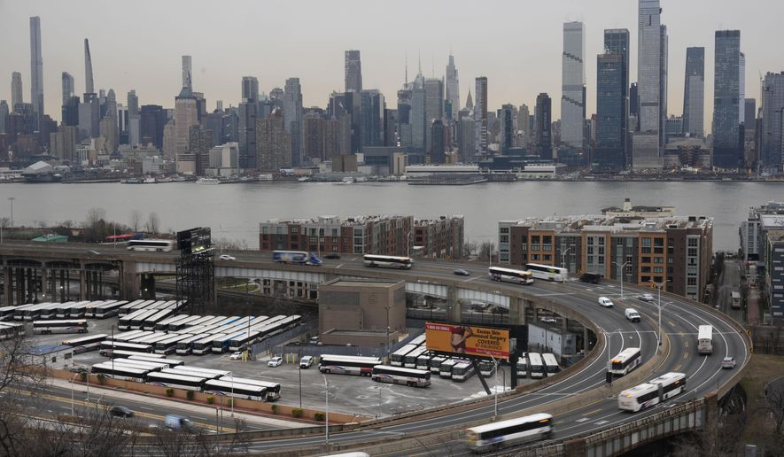 Cars enter and exit midtown Manhattan via the Lincoln Tunnel as seen from Weehawken, N.J., Monday, Jan. 6, 2025. (AP Photo/Seth Wenig)