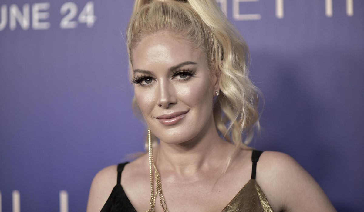 NextImg:Heidi Montag tops iTunes chart after losing house in Los Angeles wildfires