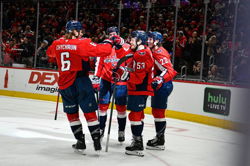 Washington Capitals forward Ethen Frank (53) celebrating with teammates after scoring during the second period of an NHL game against the Anaheim Ducks at Capital One Arena in Washington D.C. on January 14, 2025. (Photo for the Washington Times)