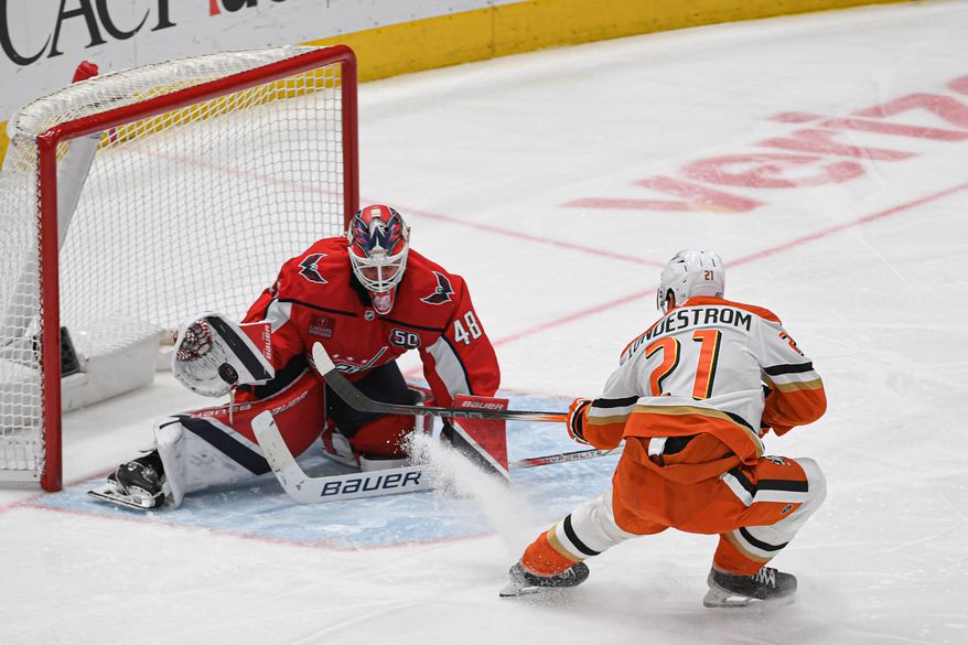 Washington Capitals goalie Logan Thompson (48) making a save on a shot by Anaheim Ducks center Isac Lundestrom (21) during the third period of an NHL game at Capital One Arena in Washington D.C. on January 14, 2025. (Photo for the Washington Times)