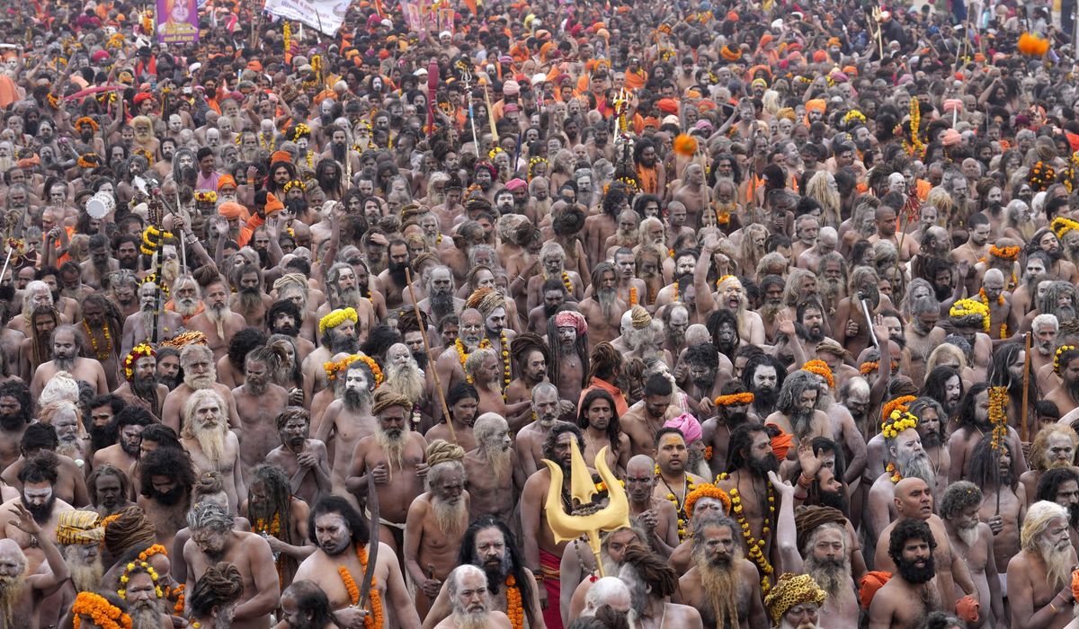 NextImg:Millions of pilgrims and naked, ash-smeared ascetics take holy dips in India’s mega Hindu festival