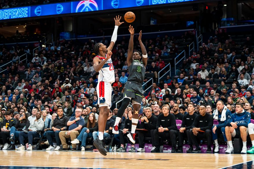 Minnesota Timberwolves Guard Anthony Edwards (5) shoots a fade away jumper over Washington Wizards Center Alex Sarr (20) at Capital One Arena, Washington, D.C., January 13th, 2025. (Photo by Jordan Sabillo, for the Washington Times)