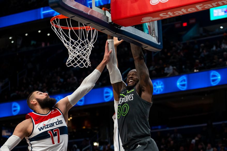 Minnesota Timberwolves forward Julius Randle (30) two hand dunks over multiple Washington Wizards players at Capital One Arena, Washington, D.C., January 13th, 2025. (Photo by Jordan Sabillo, for the Washington Times)