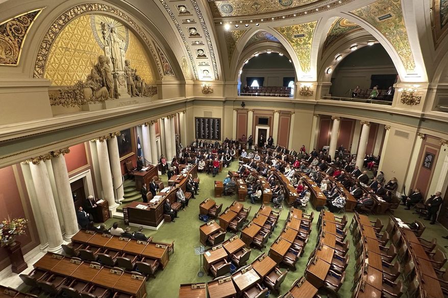 Roughly half of the Minnesota House seats remain empty as Democrats fail to show up after the legislative session gaveled in on Tuesday, Jan. 14, 2025, in St. Paul, Minnesota. (AP Photo/Mark Vancleave)