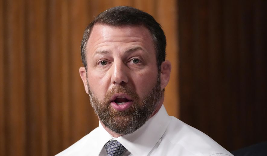 Sen. Markwayne Mullin, R-Okla. speaks at the Senate Armed Services Committee confirmation hearing for Pete Hegseth, President-elect Donald Trump's choice to be Defense secretary, at the Capitol in Washington, Tuesday, Jan. 14, 2025. (AP Photo/Alex Brandon)