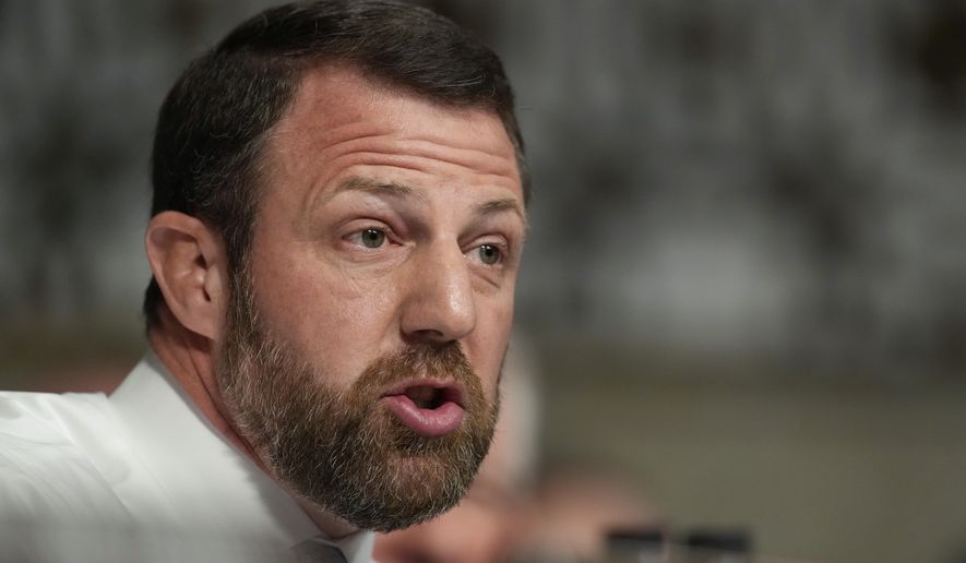 Sen. Markwayne Mullin, R-Oklahoma., speaks during the Senate Armed Services Committee confirmation hearing for Pete Hegseth, President-elect Donald Trump's choice to be Defense secretary, at the Capitol in Washington, Tuesday, Jan. 14, 2025. (AP Photo/Ben Curtis)