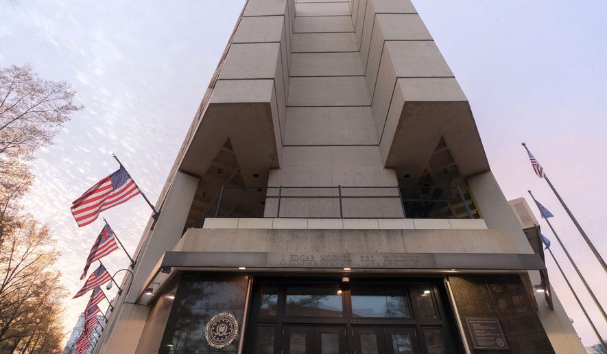 FILE - The FBI headquarters building is seen in Washington, Dec. 7, 2024. (AP Photo/Jose Luis Magana, File)
