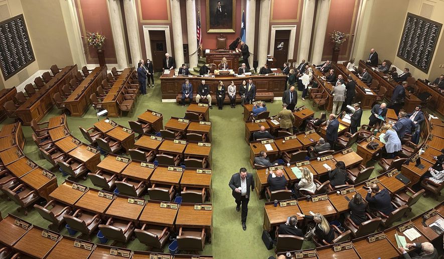 The Democratic side of the Minnesota House chamber was empty for a second straight day Wednesday, Jan. 15, 2025, in St. Paul, Minn., as Democrats continued their boycott in a power struggle with Republicans. (AP Photo/Steve Karnowski)