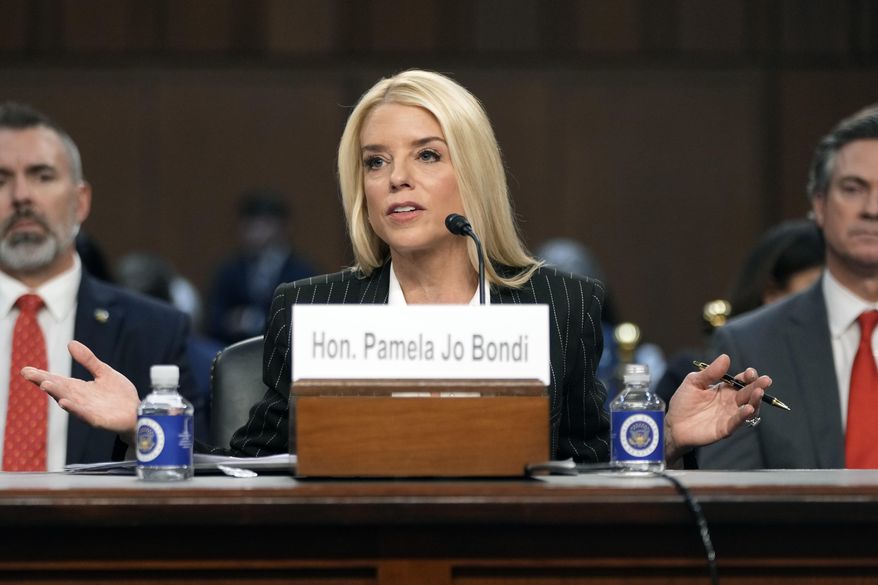 Pam Bondi, President-elect Donald Trump's choice to lead the Justice Department as attorney general, appears before the Senate Judiciary Committee for her confirmation hearing, at the Capitol in Washington, Wednesday, Jan. 15, 2025. (AP Photo/Ben Curtis)