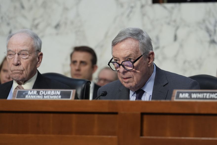 Sen. Dick Durbin, D-Ill., questions Pam Bondi, President-elect Donald Trump's choice to lead the Justice Department as attorney general, as she appears before the Senate Judiciary Committee for her confirmation hearing, at the Capitol in Washington, Wednesday, Jan. 15, 2025. (AP Photo/J. Scott Applewhite)